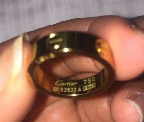 vs fake real cartier 750 ring 52833a price